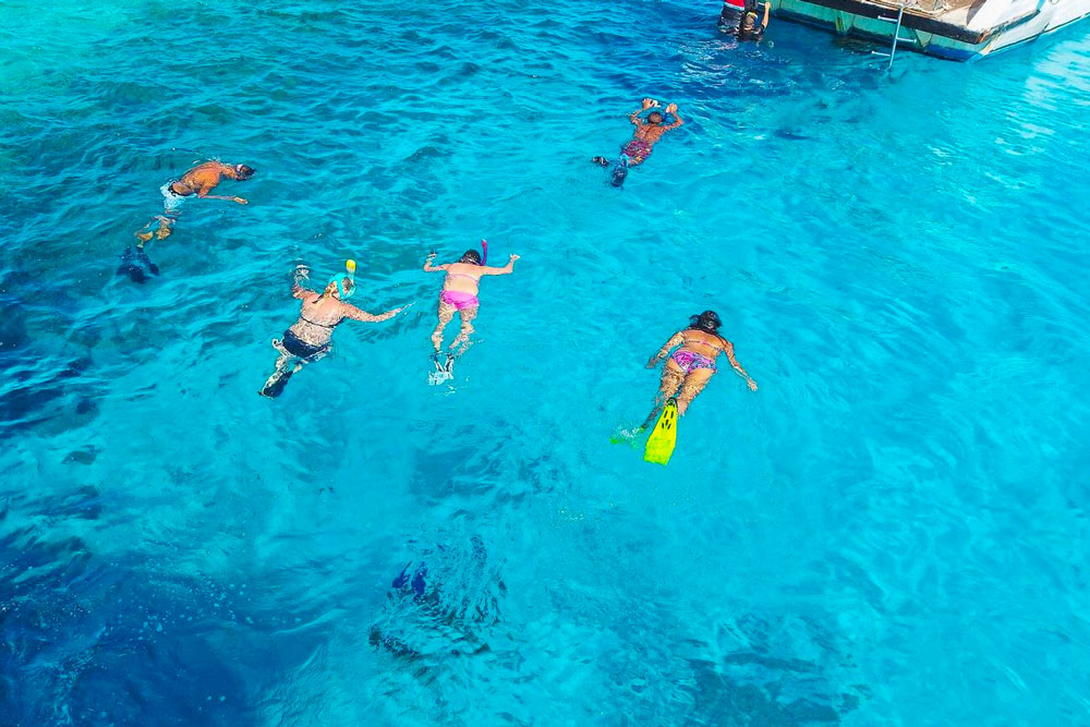 Snorkeling - How to Enjoy A Perfect Vacation in Egypt With Friends - Egypt Tours Portal